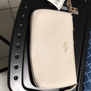 Coach wristlet, off white(cream)color, new